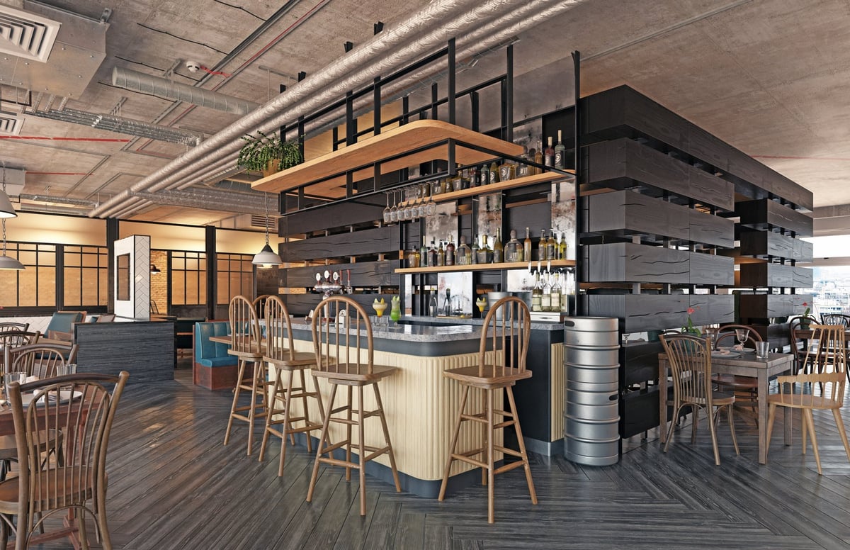 Warm amber-lit tavern interior with dark walnut wood and brass accents